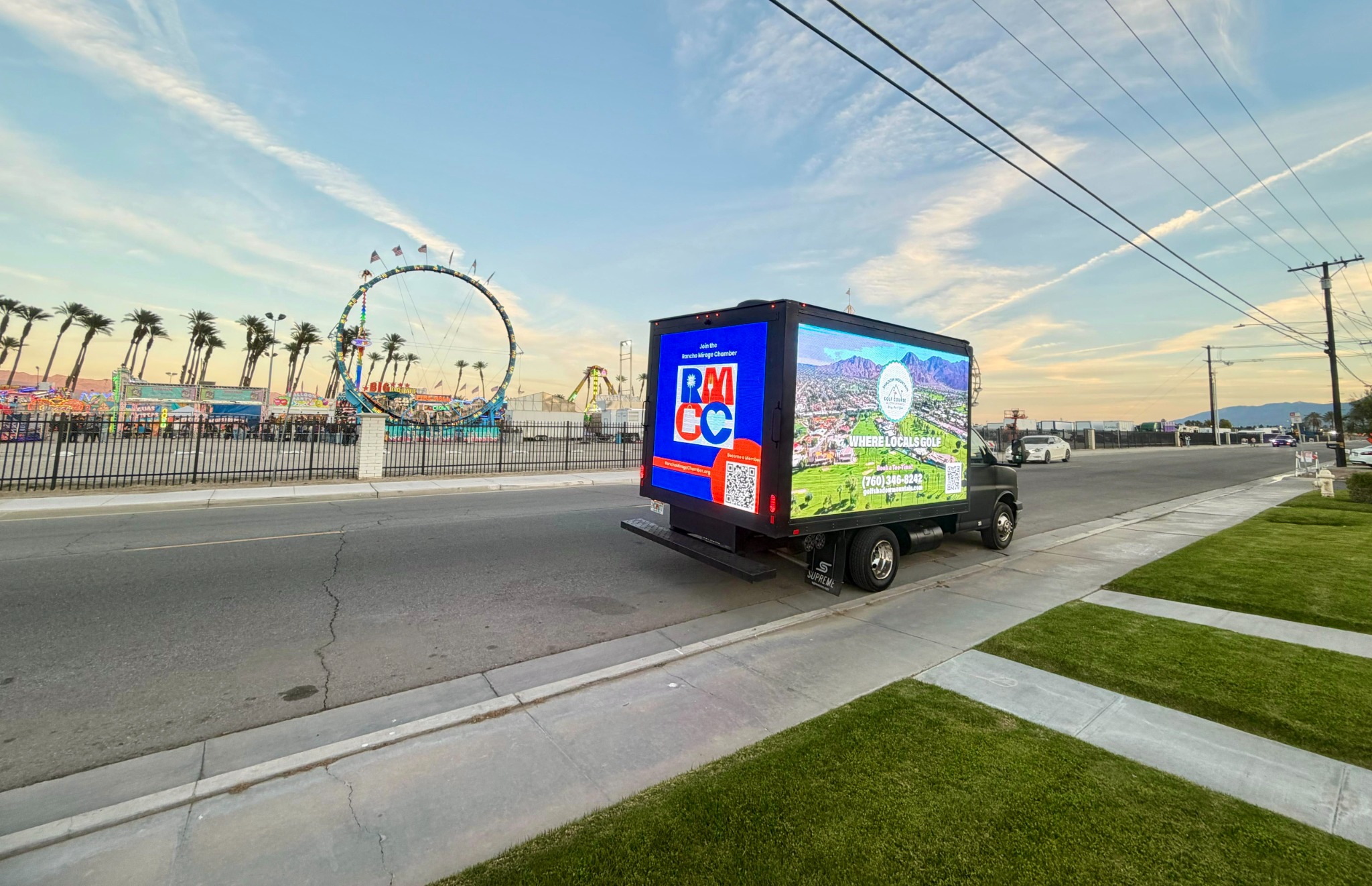 BrightPath mobile LED vehicle operating near a Ferris wheel in an event environment